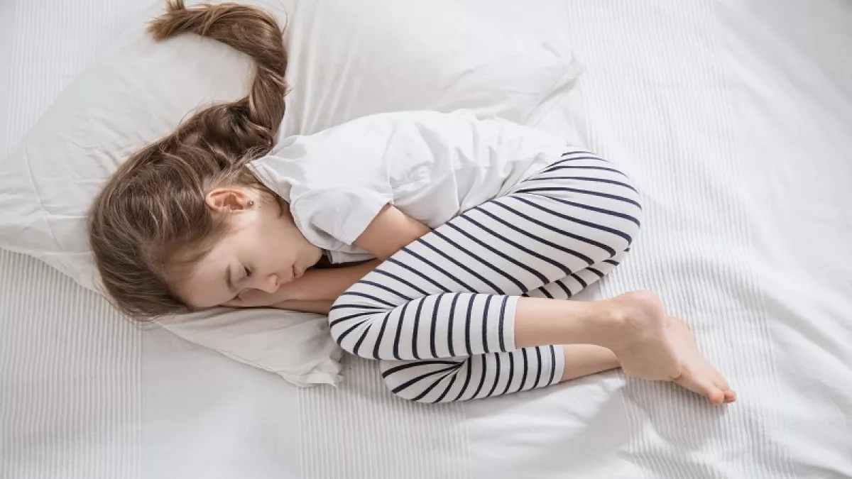 Children with long hair sleeping on the Table